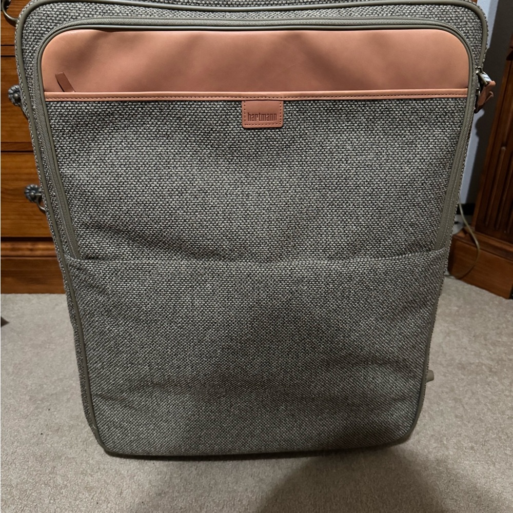 Hartmann walnut tweed 27” luggage tags attached 
Garment bag inside